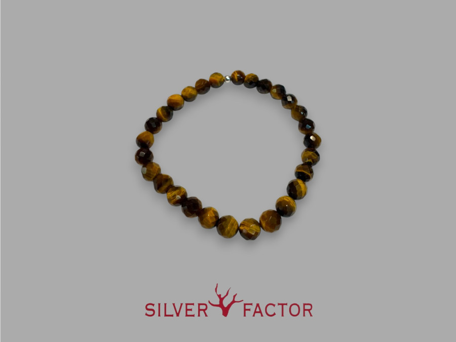 PUL.OJO TIGRE 6mm FACETADA AG. ELASTICA